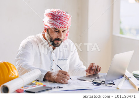 arab construction engineer architect building designer working with floor plan 101150471