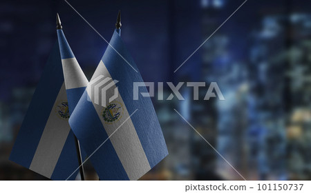 Small flags of the Salvador on an abstract blurry background Small flags of the Salvador on an abstract blurry background 101150737