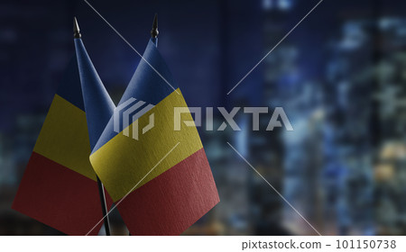 Small flags of the Romania on an abstract blurry background Small flags of the Romania on an abstract blurry background 101150738