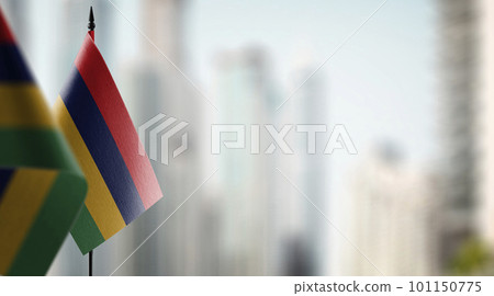 Small flags of the Mauritius on an abstract blurry background Small flags of the Mauritius on an abstract blurry background 101150775