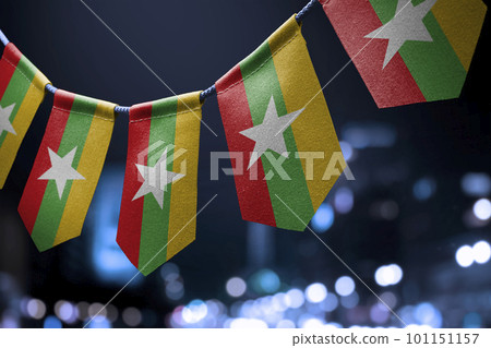 A garland of Myanmar national flags on an abstract blurred background A garland of Myanmar national flags on an abstract blurred background 101151157