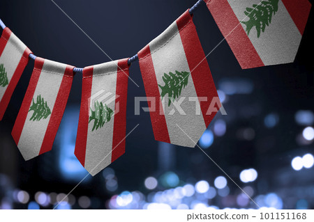 A garland of Lebanon national flags on an abstract blurred background 101151168