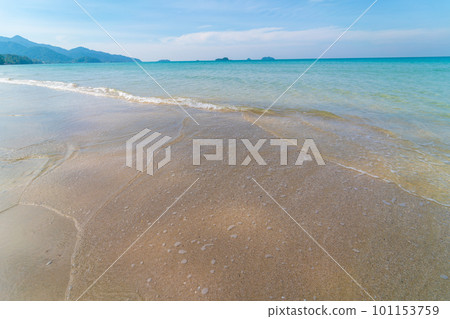 Sea beach wave clear turquoise sea water smooth sand blue sky with cloud Sea beach wave clear turquoise sea water smooth sand blue sky with cloud 101153759