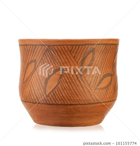Clay cup with ornament, without handle. Country style. Close-up. Isolated on white background. Clay cup with ornament, without handle. Country style. Close-up. Isolated on white background. 101155774
