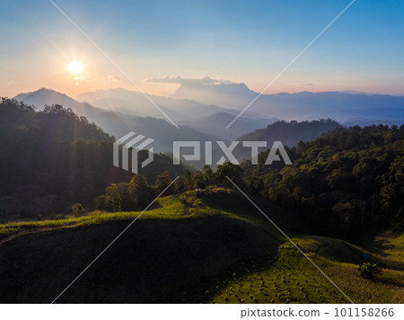 Sunrise over mountain range, Hadubi viewpoint, Chiang Mai, Thailand. Sunrise over mountain range, Hadubi viewpoint, Chiang Mai, Thailand. 101158266