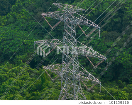 Aerial view of  electricity tower on mountain 101159316