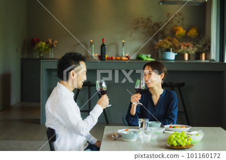 A couple dining at a restaurant A couple dining at a restaurant 101160172