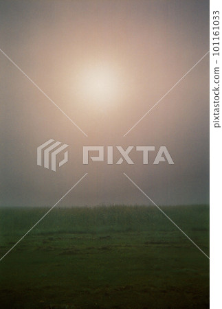 Sun shining in the morning mist of Biei-cho photographed on film 101161033