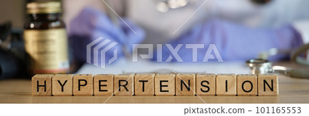 Hypertension word on cubes in cardiologist office in cardiology clinic Hypertension word on cubes in cardiologist office in cardiology clinic 101165553