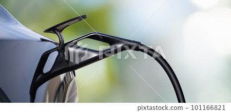 Close up of electric car inlet with a connected charging cable Close up of electric car inlet with a connected charging cable 101166821