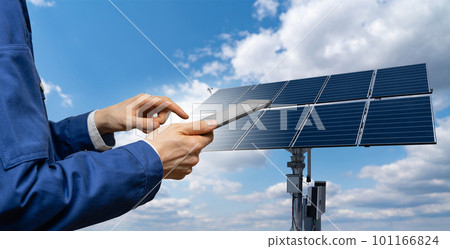 Engineer with tablet computer on a background of solar energy power station Engineer with tablet computer on a background of solar energy power station 101166824