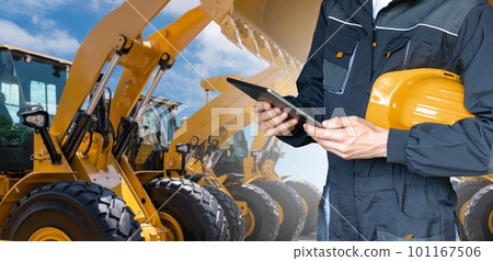 Engineer with helmet and digital tablet 101167506