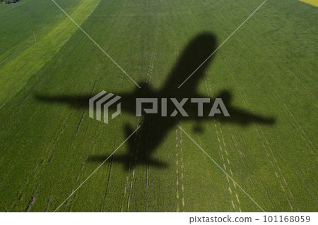 Shadow of the plane on the agricultural field. Shadow of the plane on the agricultural field. 101168059