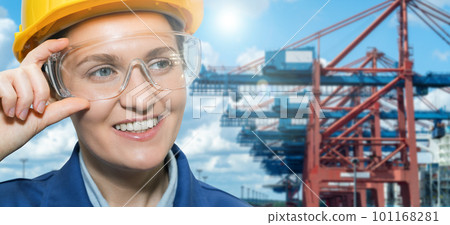 Portrait of woman port manager in helmet and eyeglasses 101168281