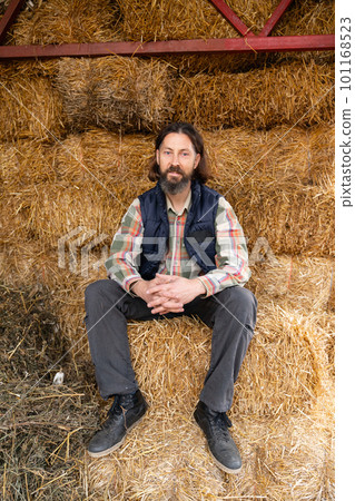 Farmer in the hayloft. Farmer in the hayloft. 101168523