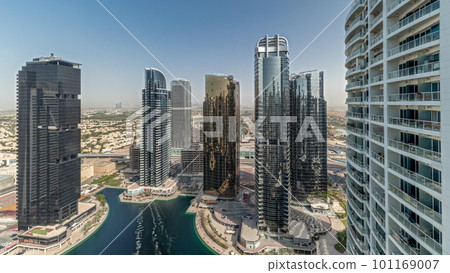 Panorama showing tall residential buildings at JLT aerial timelapse, part of the Dubai multi commodities centre mixed-use district. 101169007
