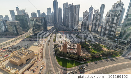 Bay Avenue with modern towers residential development in Business Bay aerial panoramic all day timelapse, Dubai 101169102