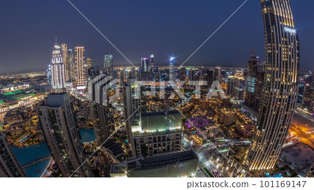 Aerial panoramic view of a big futuristic city day to night timelapse. Business bay and Downtown 101169147