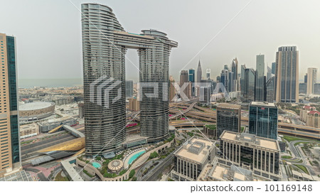 Pnorama showing futuristic Dubai Downtown and finansial district skyline aerial timelapse. 101169148