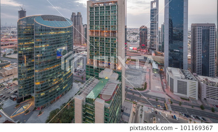 Dubai international financial center skyscrapers aerial day to night timelapse. Dubai international financial center skyscrapers aerial day to night timelapse. 101169367