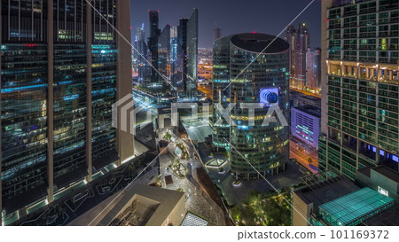 Dubai international financial center skyscrapers aerial all night timelapse. 101169372