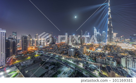 Dubai Downtown all night timelapse with tallest skyscraper and other towers 101169381