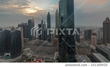 Sunset over financial center of Dubai city with luxury skyscrapers timelapse, Dubai, United Arab Emirates 101169410