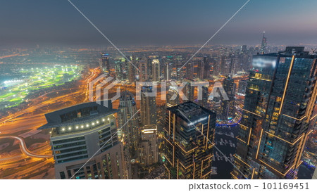 Panorama of Dubai Marina with JLT skyscrapers day to night timelapse, Dubai, United Arab Emirates. Panorama of Dubai Marina with JLT skyscrapers day to night timelapse, Dubai, United Arab Emirates. 101169451