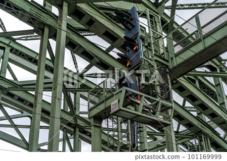 traffic lights for trains on the metal bridge of the railway line 101169999