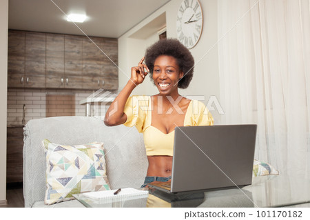 Portrait of African American Black Woman. Generating ideas, forget, think, brainstorm. Business plan, project, idea, freelance laptop work at home. thumbs up Portrait of African American Black Woman. Generating ideas, forget, think, brainstorm. Business plan, project, idea, freelance laptop work at home. thumbs up 101170182