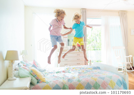 Child playing in bed. Kids room. Boy at home. Child playing in bed. Kids room. Boy at home. 101170693