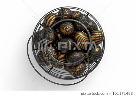 Golden and black Easter eggs in metal wire basket or chocolate eggs 101171498