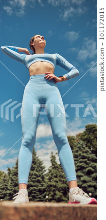 Beautiful fit young woman jogger is running outdoors Beautiful fit young woman jogger is running outdoors 101172015