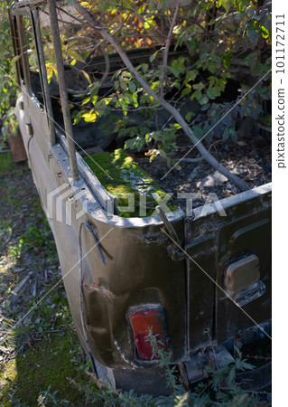 Broken abandoned rusty old vehicle. Retro damaged transportation. Broken abandoned rusty old vehicle. Retro damaged transportation. 101172711