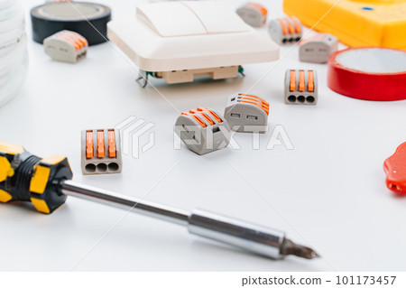 working tools for an electrician on a white background. 101173457