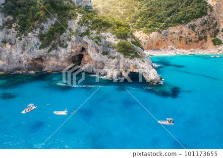 Aerial view of yacht and boats on blue sea at sunny day in summer 101173655