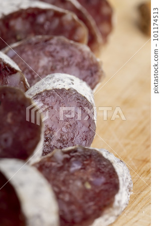 Chunks of sliced sausage with white mold 101174513