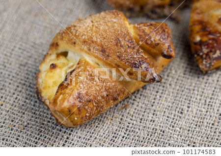 Bagels made of cottage cheese dough stuffed with cottage cheese and raisins 101174583