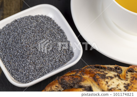 A large number of poppy seeds on the cooking table 101174821