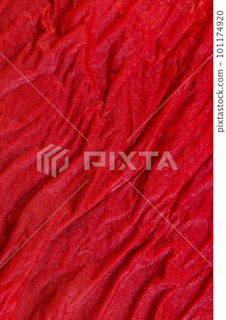 Wet red napkin on the table, close-up Wet red napkin on the table, close-up 101174920