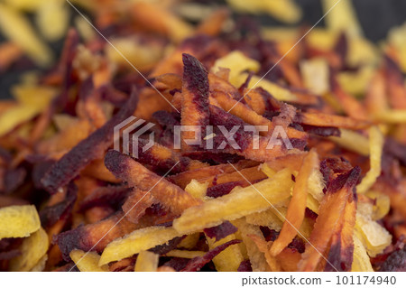 Finely grated red-orange carrots in the kitchen Finely grated red-orange carrots in the kitchen 101174940