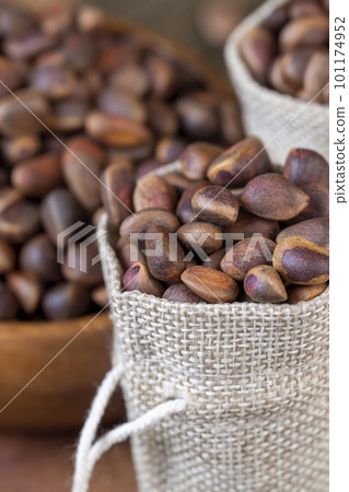 a bunch of pine nuts in the shell a bunch of pine nuts in the shell 101174952