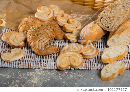 Baked goods on wicker mat 101177557
