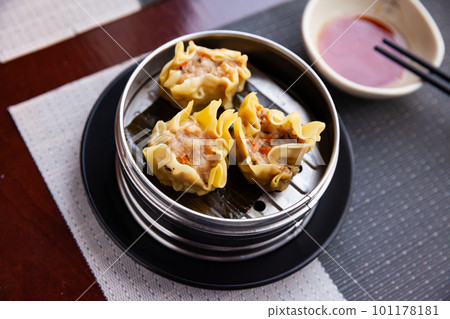 Chinese dish - dumplings shumai with soy sauce Chinese dish - dumplings shumai with soy sauce 101178181