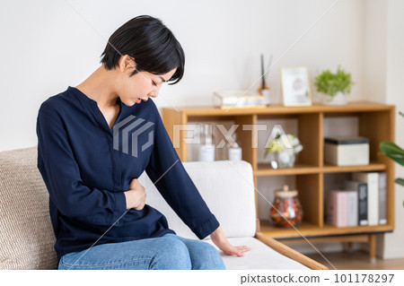 young woman with a sore side 101178297