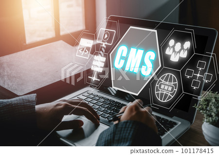 CMS, Content management system concept, Person hand using laptop computer with Content management system icon on virtual screen background, business web computer website administration. 101178415