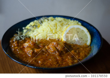 Chicken spice curry with domestic lemon 101178550