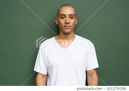 Portrait of handsome bald man wearing t-shirt Portrait of handsome bald man wearing t-shirt 101179186