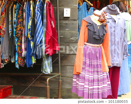 Second-hand clothing store selling colorful clothes 101180035