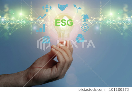 Global ESG technology concept. Man's hand presses a holographic button. Environmental, Social, and Corporate Governance idea.  Global ESG technology concept. Man's hand presses a holographic button. Environmental, Social, and Corporate Governance idea.  101180373